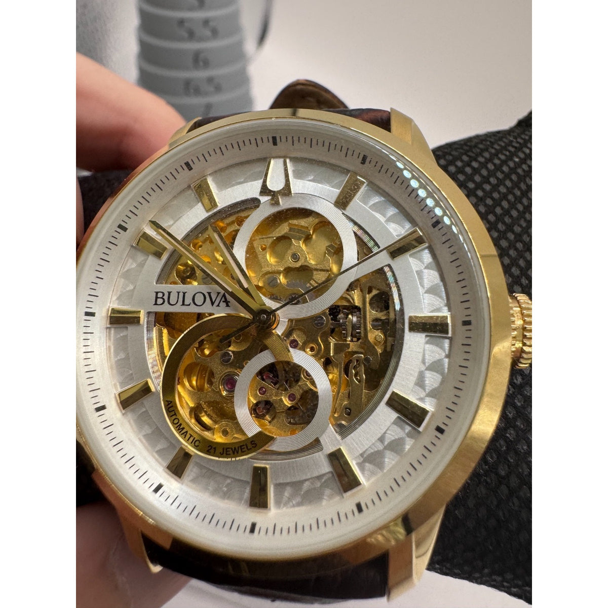 BULOVA Sutton Automatic Gold Tone Skeleton Unisex Watch NEW W IMPERF